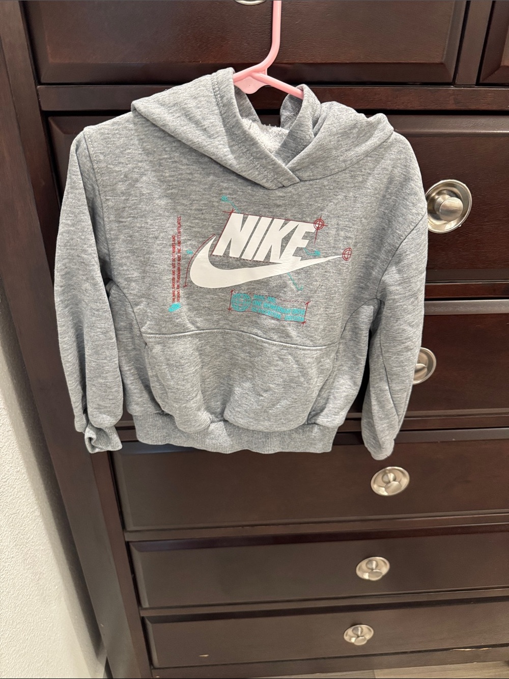 Nike Gray Pullover Hoodie with White Swoosh and Teal Accents
